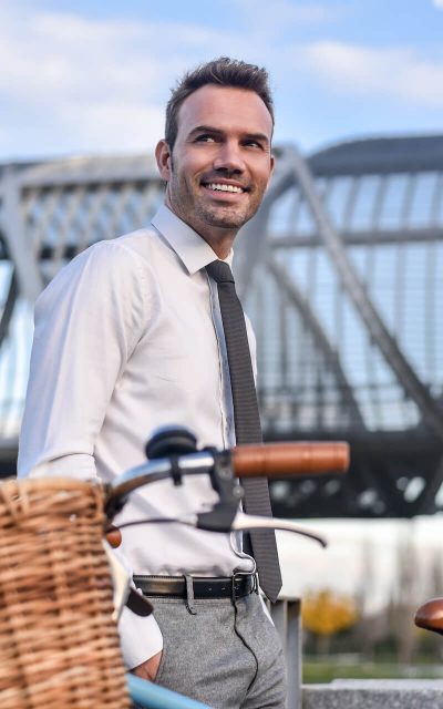 business-man-with-vintage-bicycle-by-the-river-2021-08-26-20-17-02-utc