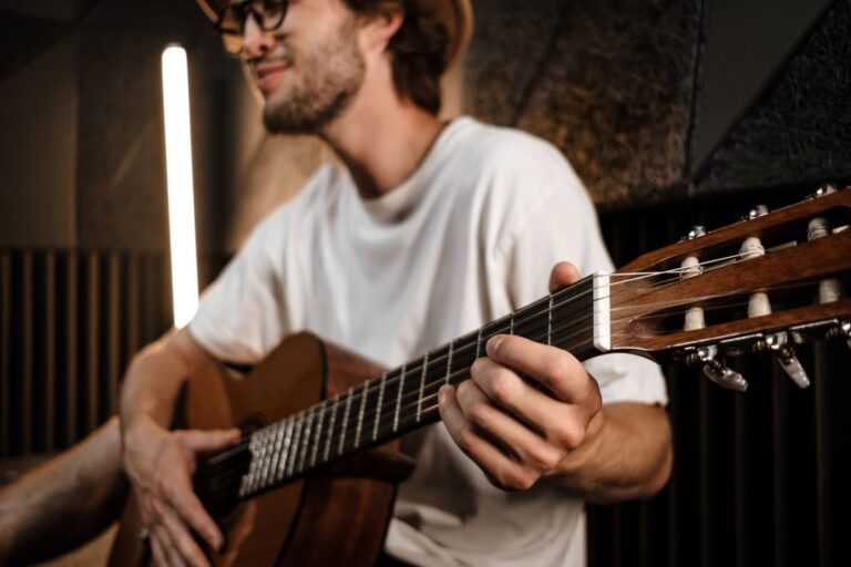close-up-young-attractive-male-musician-confidentl-2021-08-28-14-51-13-utc