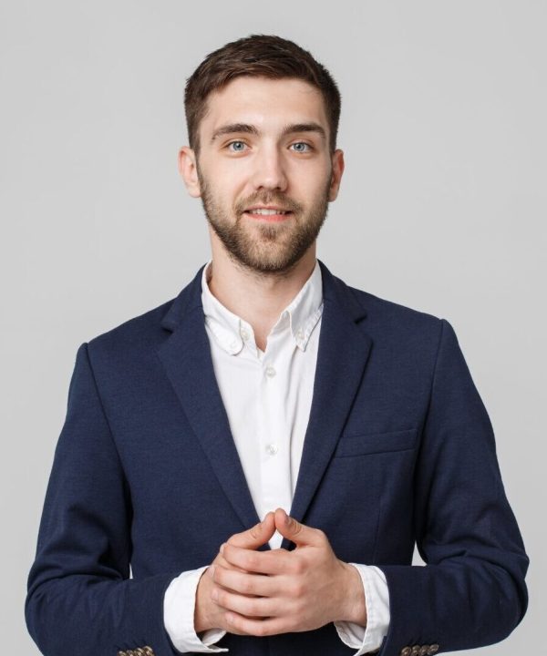 Business Concept - Portrait Handsome Business man holding hands with confident face. White Background.