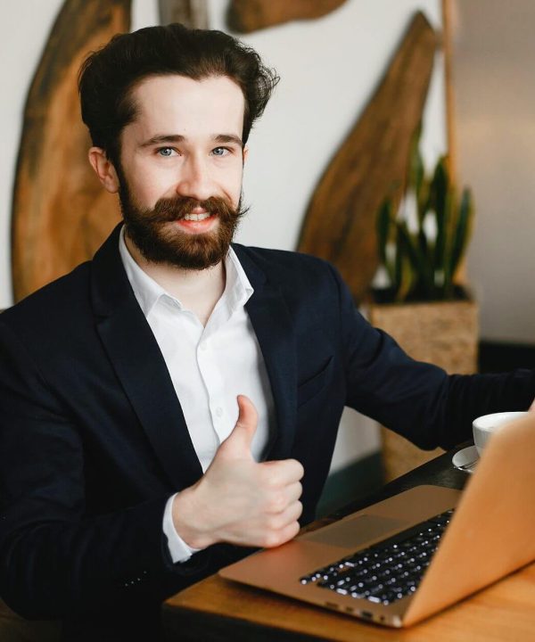 stylish-businessman-working-in-a-office-2021-08-26-18-30-33-utc-e1636346876362