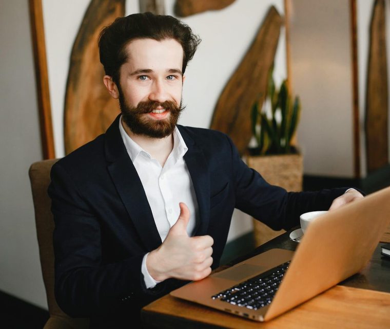 stylish-businessman-working-in-a-office-2021-08-26-18-30-33-utc-e1636346876362