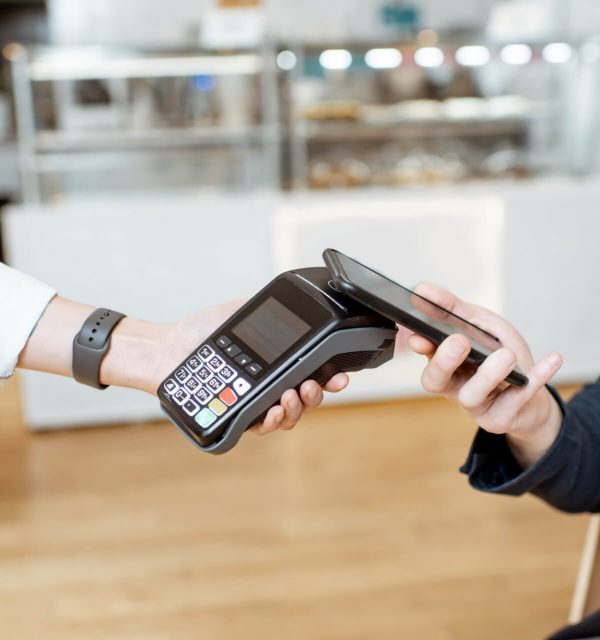 paying-with-smart-phone-at-the-cafe-2021-05-08-00-50-05-utc